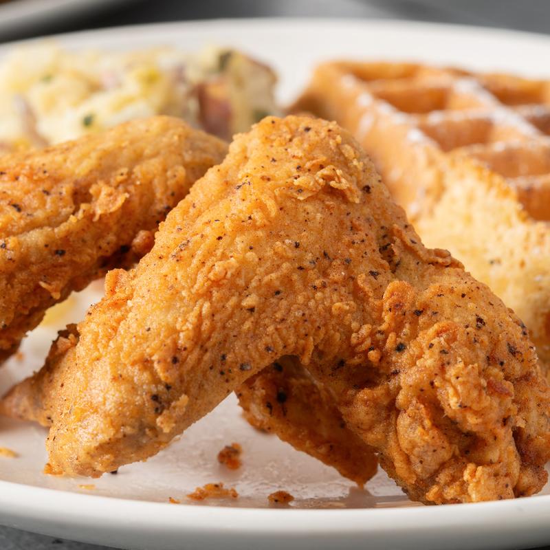 Close-up of crispy fried chicken wings