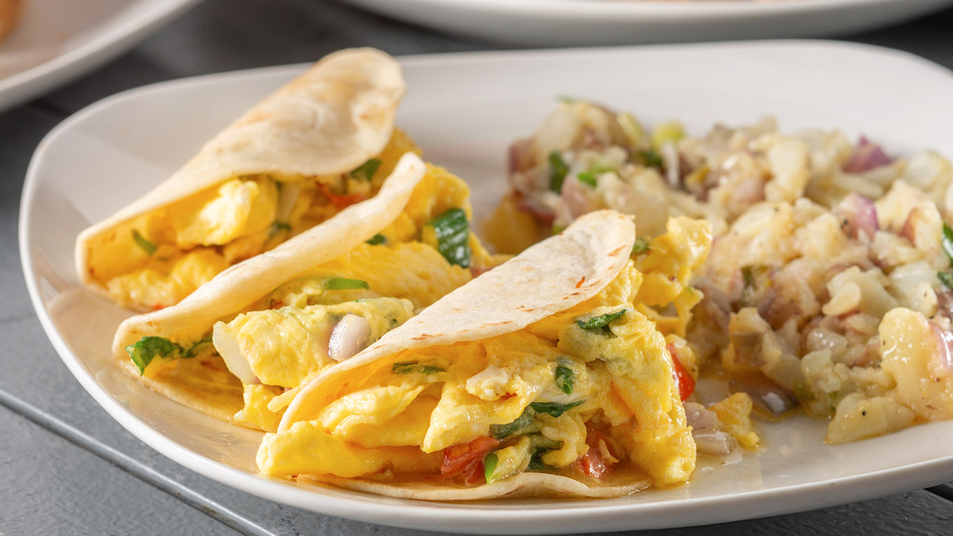 Breakfast tacos with scrambled eggs, peppers and heavenly potatoes